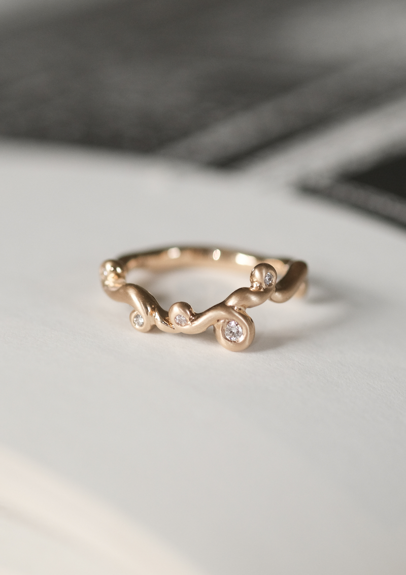 ORBIT DIAMOND RING 0.08CT