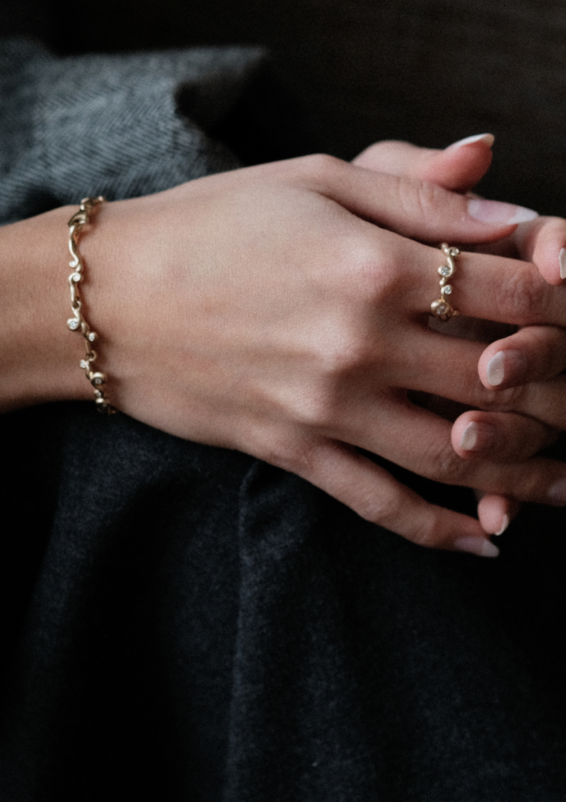 ORBIT DIAMOND RING 0.08CT