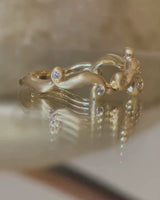 ORBIT DIAMOND RING 0.08CT