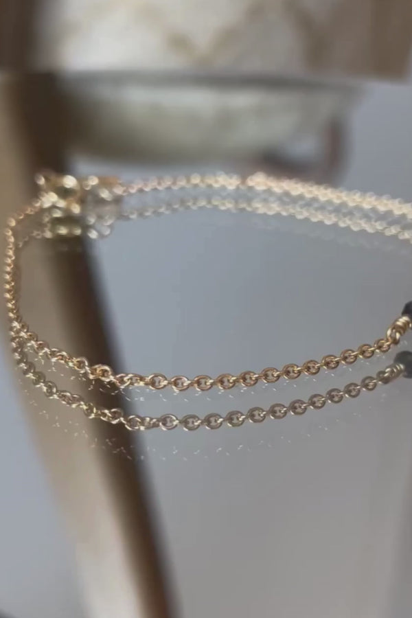 ALAIA BLACK DIAMOND GOLD BRACELET